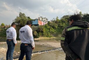Instalan retenedoras de basura en la presa El Capulín de Huixquilucan